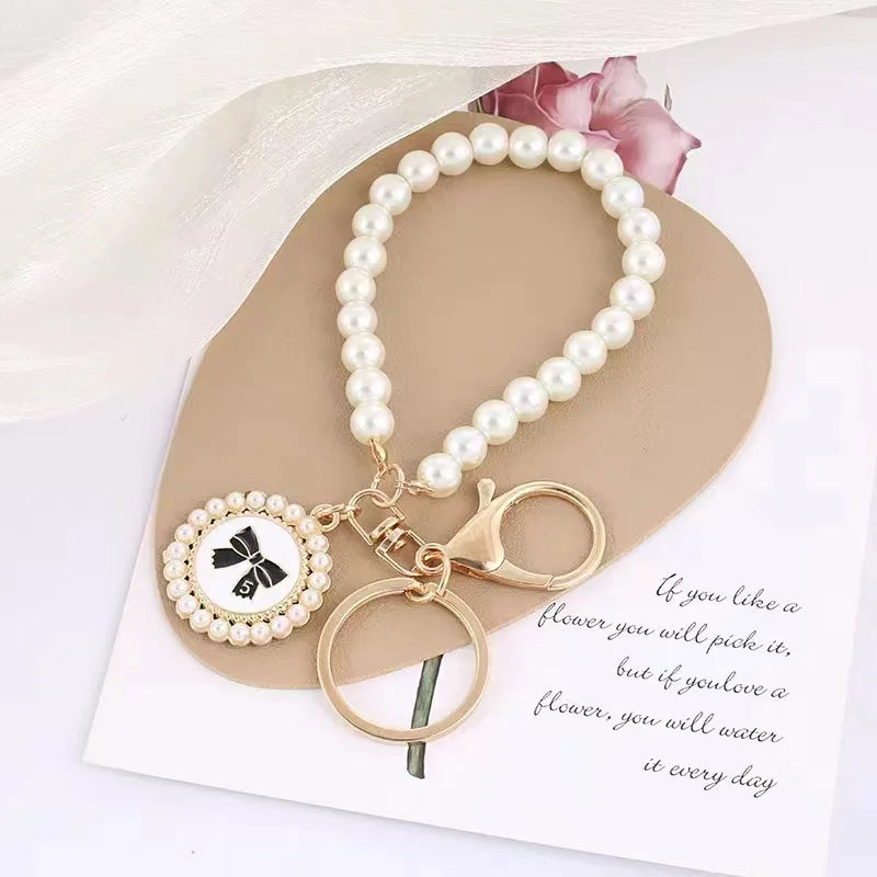 luckacco picks cute pearl keychain for women girls shiny pearl bead shell phone bag backpack charm accessory car key key chain pendant
